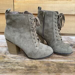 Candie’s green faux suede lace up heeled booties